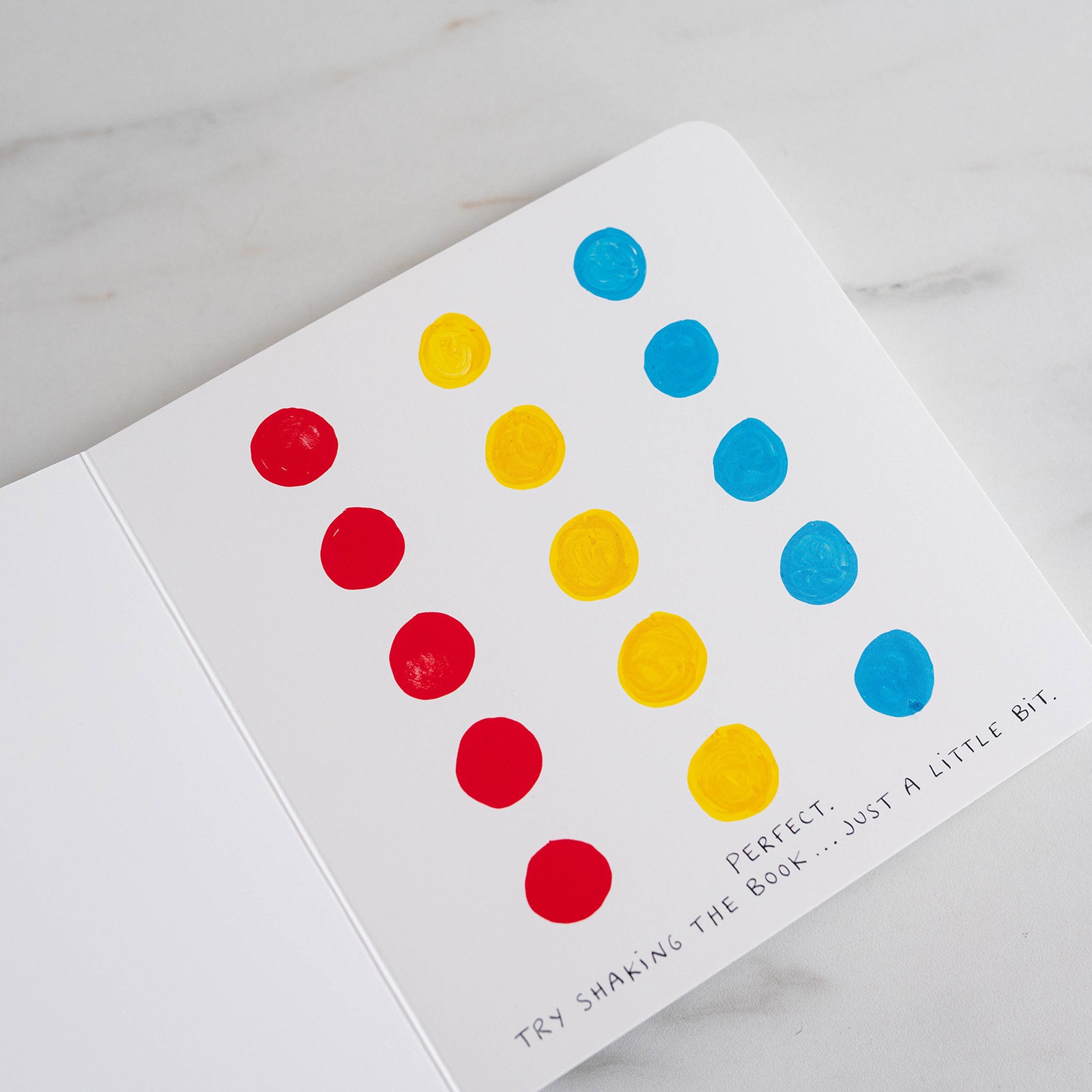 "Press Here" by Herve Tullet FINNBIRD - book Raincoast Books