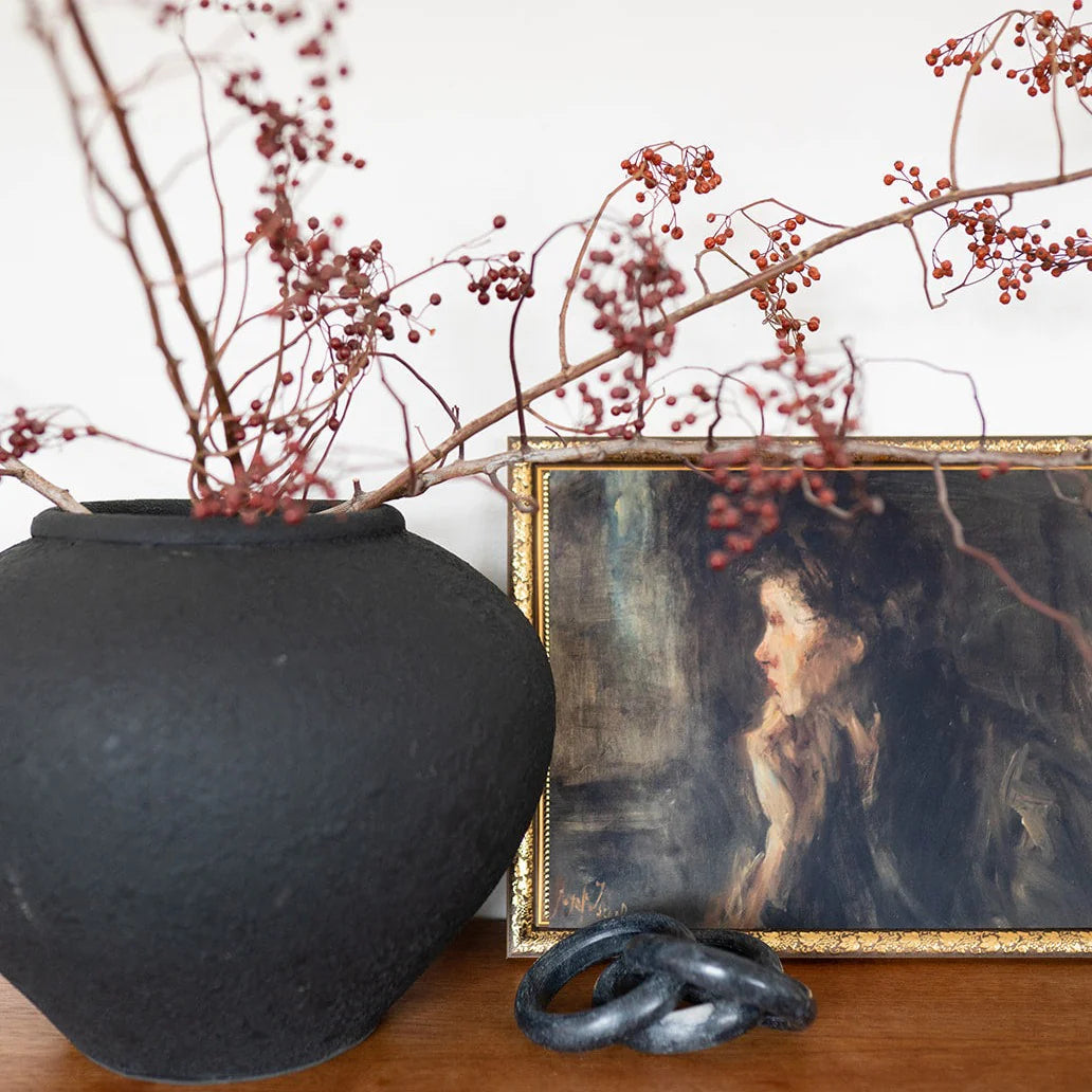 Vintage inspired, dark and moody oil painting of a portrait.
