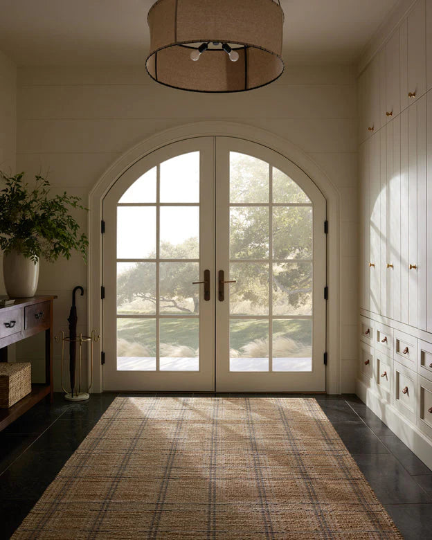 The Judy Collection by Chris Loves Julia x Loloi is an effortlessly sophisticated handwoven area rug made with natural fibers.