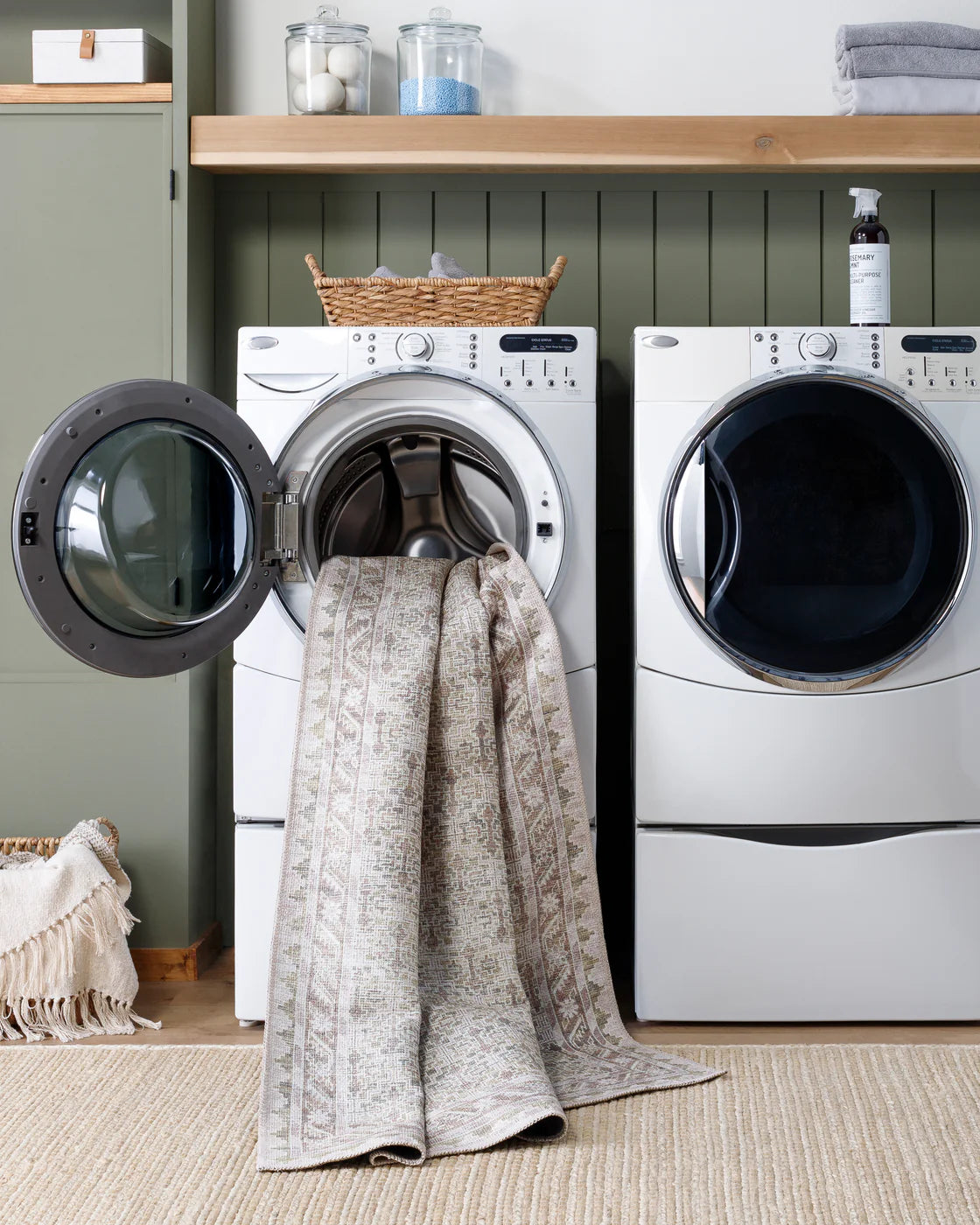  machine-washable rugs with a muted color palette and vintage-inspired patterns.