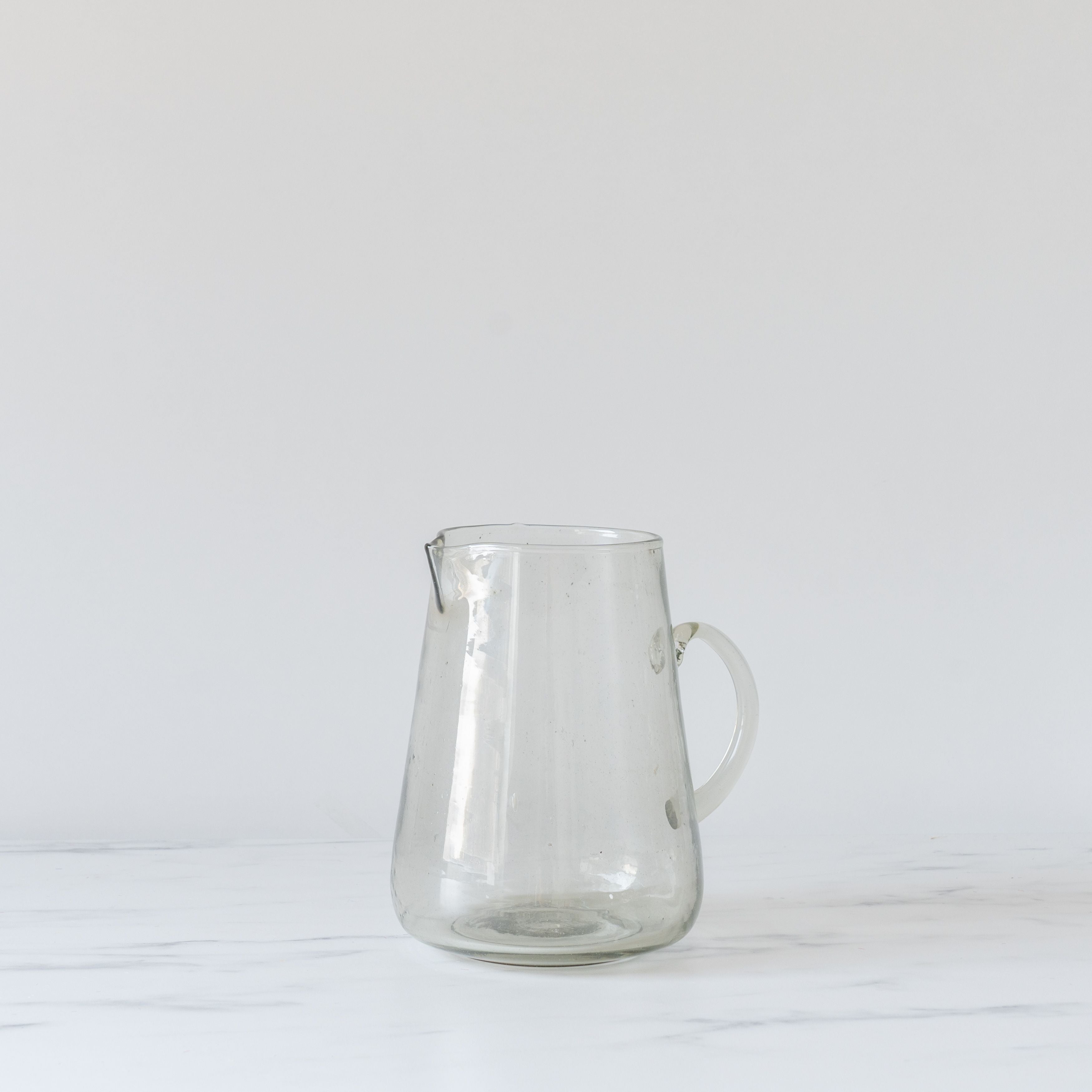 Ibina Pitcher – Rug and Weave