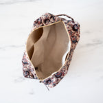 Floral block print toiletry bag with interior pockets
