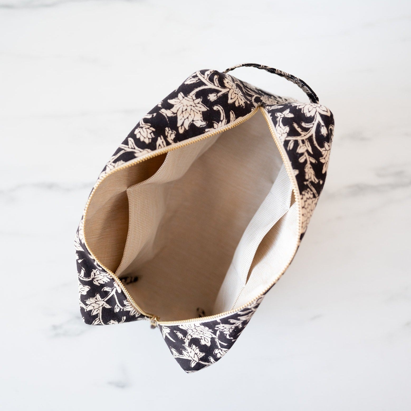 Block print toiletry bag with interior pockets